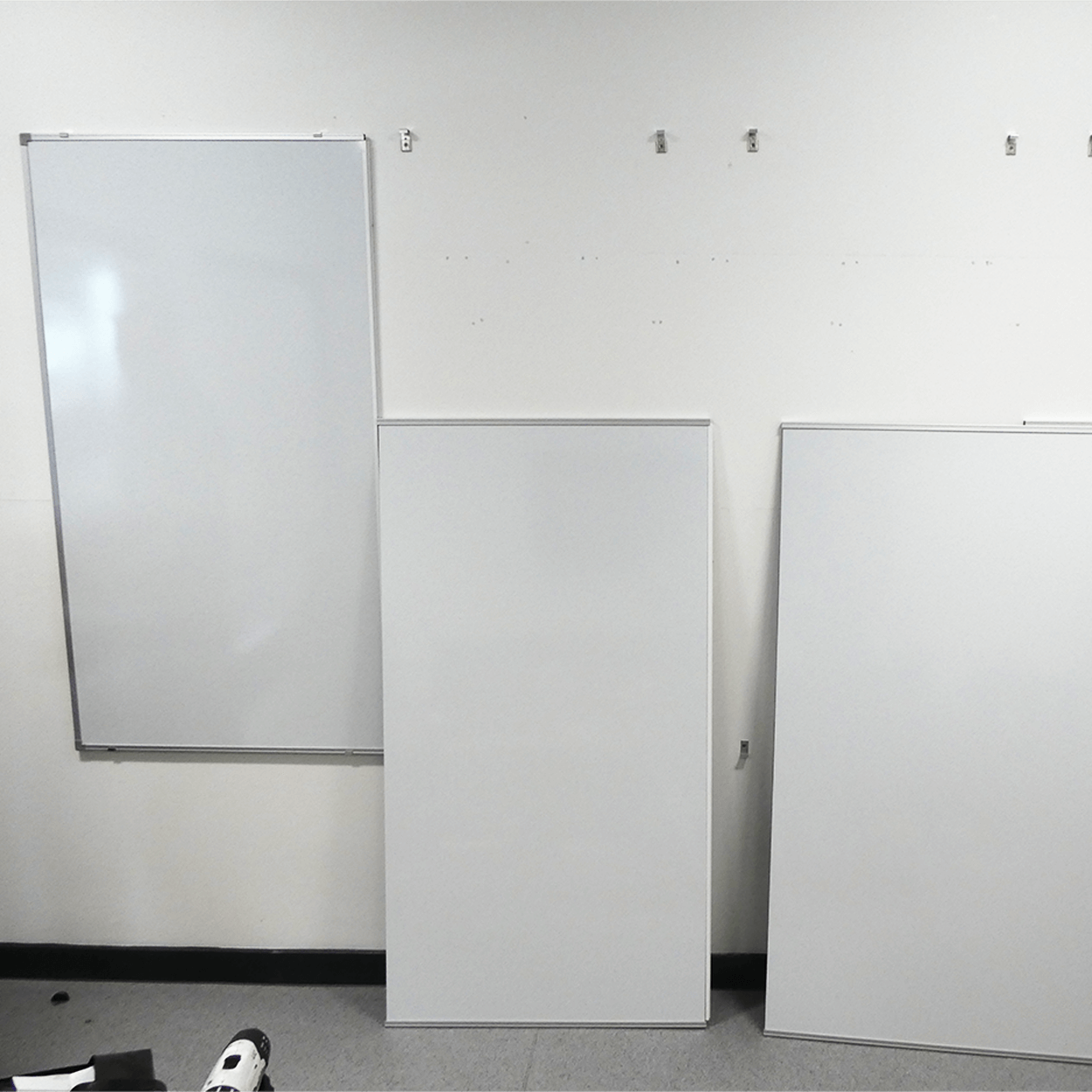 A giant whiteboard for $14 (plus nails)